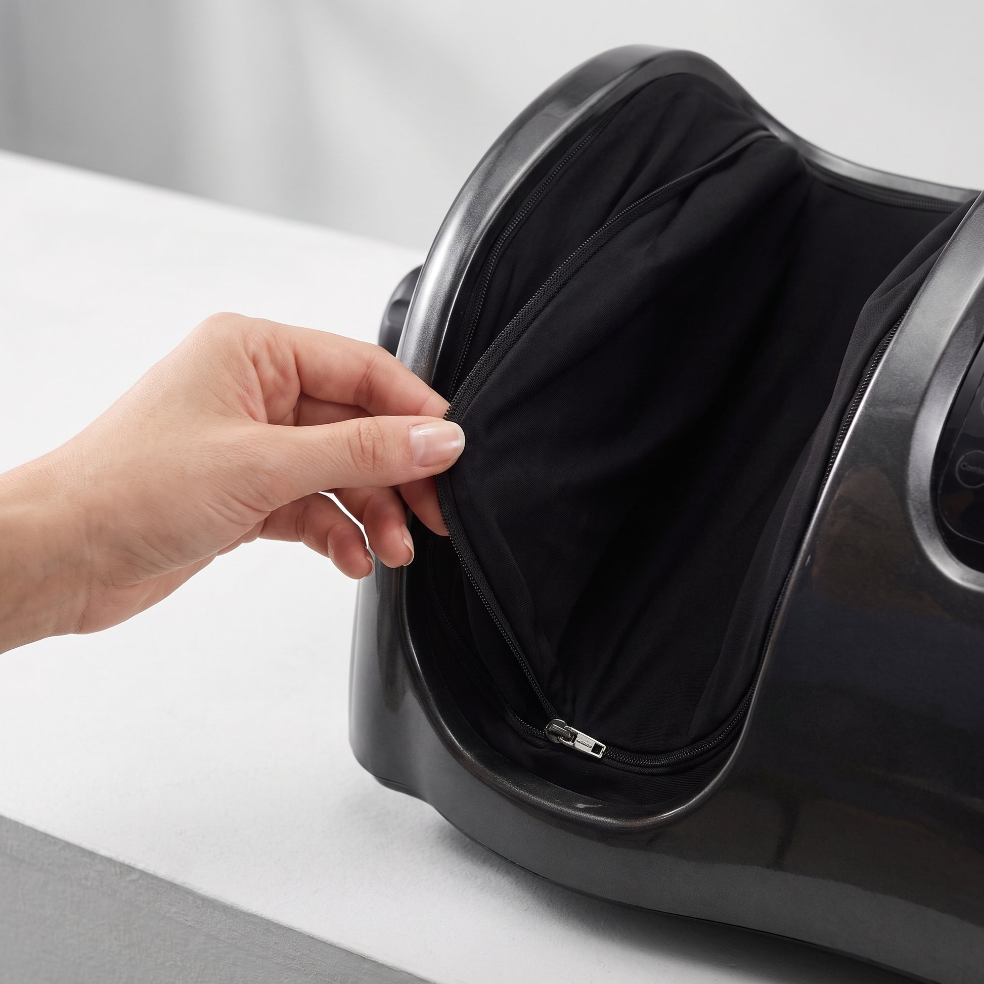The removable, washable fabric liners of the Heated Shiatsu Foot & Calf Massager