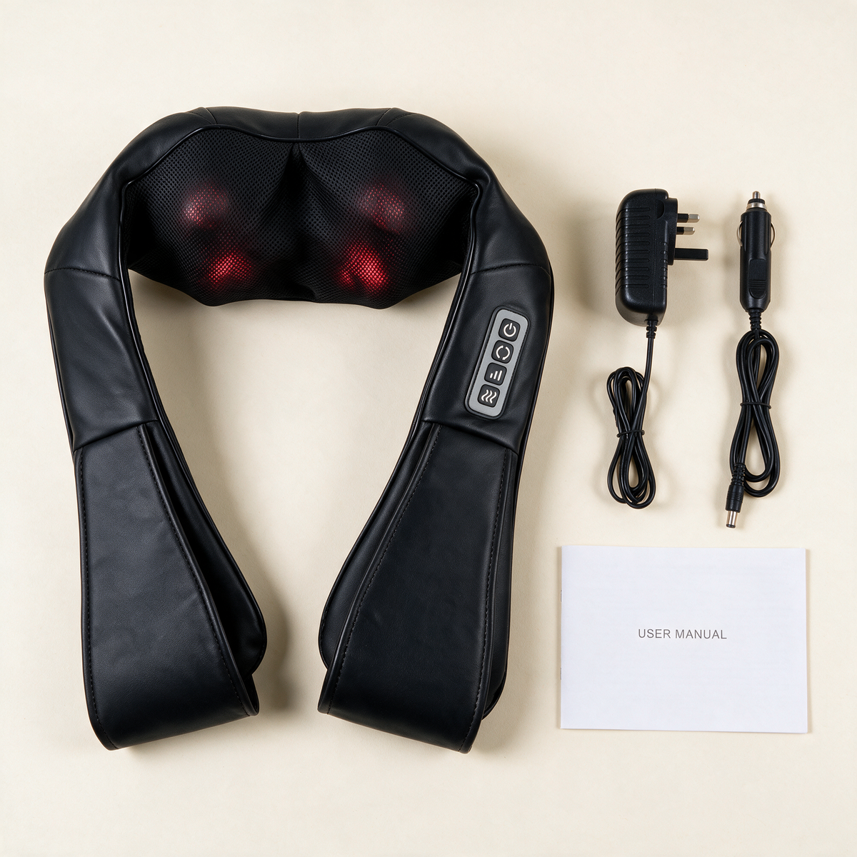 What is included with the Heated Shiatsu Neck & Shoulder Massager: the massager, a power adapter with a UK plug, an in-car power cable and a user manual